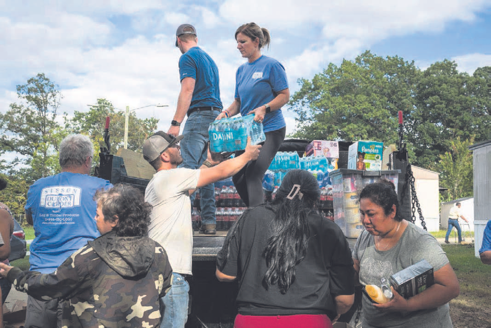 Assistance is delayed in arriving to certain Latino neighborhoods in storm-affected North Carolina.